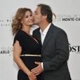 La jolie Ingrid Chauvin, enceinte, aux côtés de son mari Thierry Peythieu lors de la cérémonie d'ouverture du 53e festival de Monte-Carlo au Forum Grimaldi à Monaco, le 9 juin 2013.
