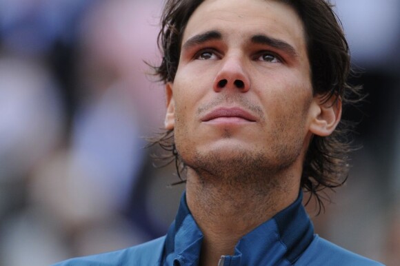 Rafael Nadal, en larmes après son huitième sacre à Roland-Garros le dimanche 9 juin 2013 après s'être impsoé face à David Ferrer (6-3, 6-2, 6-3)