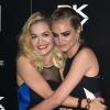Rita Ora et Cara Delevingne assistent à la soirée de lancement de DKNY ArtWorks à la Lambeth Fire Station. Londres, le 12 juin 2013.