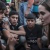 Angelina Jolie rend visite à des réfugiés syriens dans un camp à la frontière jordanienne, le 18 juin 2013.