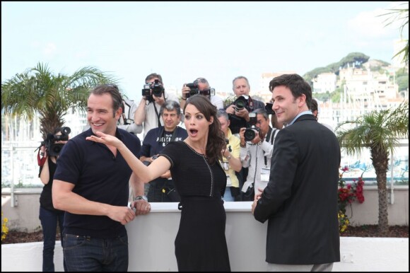 Jean Dujardin, Bérénice Bejo et Michel Hazanavicius lors du Festival de Cannes 2011 et la présentation de The Artist