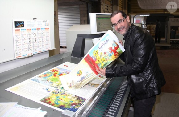 Exclusif - Fabien Rypert règle les derniers détails à l'imprimerie PPO pour leur ouvrage "Les Pochitos", à Palaiseau le 28 Mai 2013.