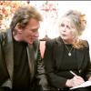 Johnny Hallyday et Brigitte Bardot réunis pour le Noël des animaux, organisé par la Fondation Bardot, à Levallois-Perret, le 18 décembre 2004.