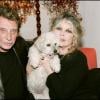 Johnny Hallyday et Brigitte Bardot réunis pour le Noël des animaux, organisé par la Fondation Bardot, à Levallois-Perret, le 18 décembre 2004.