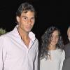 Rafael Nadal et sa compagne Maria Francisca Perello dit Xisca assistent au concert de Julio Iglesias à Barcelone le 26 juin 2013, quelques jours après le choc de son élimination au premier tour de Wimbledon