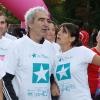 Raymond Domenech et Estelle Denis - 10e édition de de la course Odyssea au profit de de la lutte contre le cancer du sein à Paris le 7 octobre 2012.