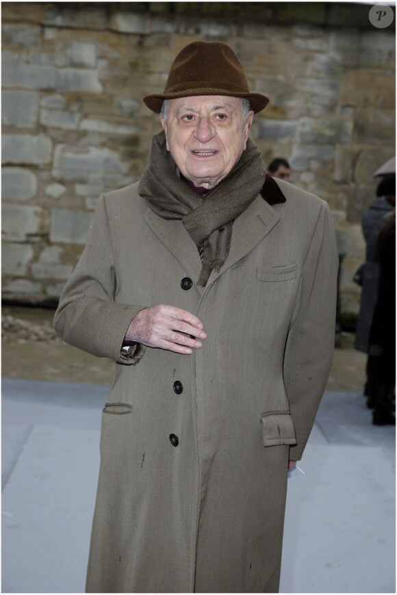 Pierre Bergé à la présentation de la collection Haute Couture Dior au jardin des Tuileries, à Paris le 20 janvier 2013.