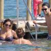 Cesc Fabregas et sa compagne Daniella Semaan profitent de leurs vacances à Ibiza, le 4 juillet 2013, où ils ont croisé la compagne de Lionel Messi, Antonella Roccuzzo