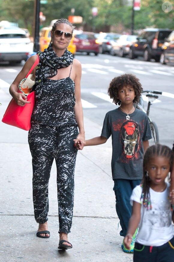 Heidi Klum, ses enfants et son compagnon Martin Kirsten sont allés dîner au restaurant "Tribeca Grill" à New York. Le 7 juillet 2013