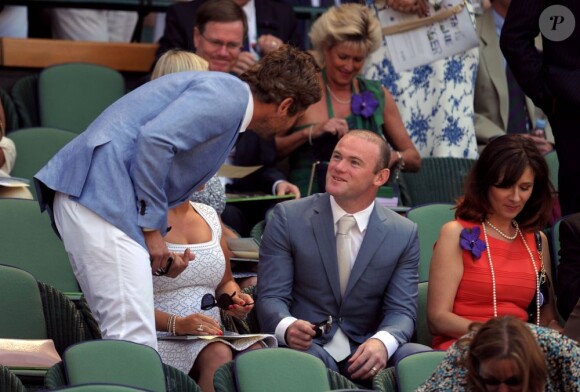 Wayne Rooney et Gerard Butler lors de la finale de Wimbledon remportée par Andy Murray face à Novak Djokovic (6-4, 7-5, 6-4) le 7 juillet 2013 au All England Lawn Tennis and Croquet Club de Londres