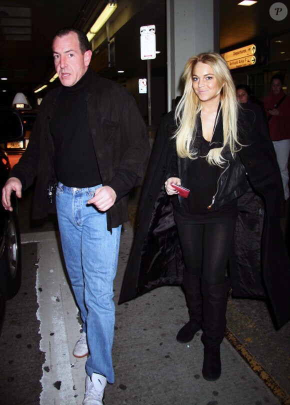 Lindsay Lohan et son père Michael à l'aéroport de JFK de New York le 4 janiver 2008