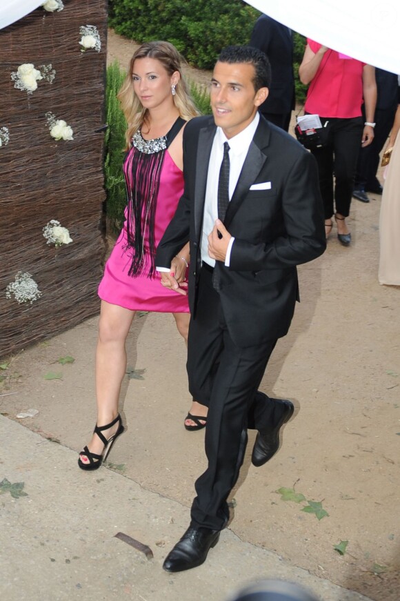 Pedro Rodriguez et sa petite amie Carolina Martin au mariage de son coéquipier Xavi à Blanes le 13 juillet 2013.