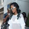 Rihanna, sexy, quitte son hotel pour se rendre a Birmingham pour son concert, le 18 juillet 2013