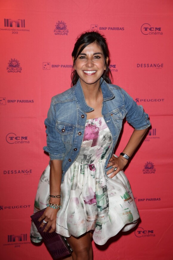 Reem Kherici (robe Dina JSR) à la projection du film Paris à tout prix lors du Champs Elysées Film Festival à Paris, le 14 juin 2013.
