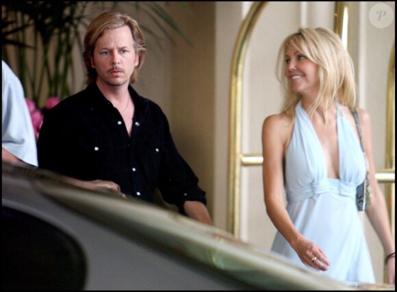 Heather Locklear et David Spade à la sortie d'un hôtel de Los Angeles, le 27 juin 2006.