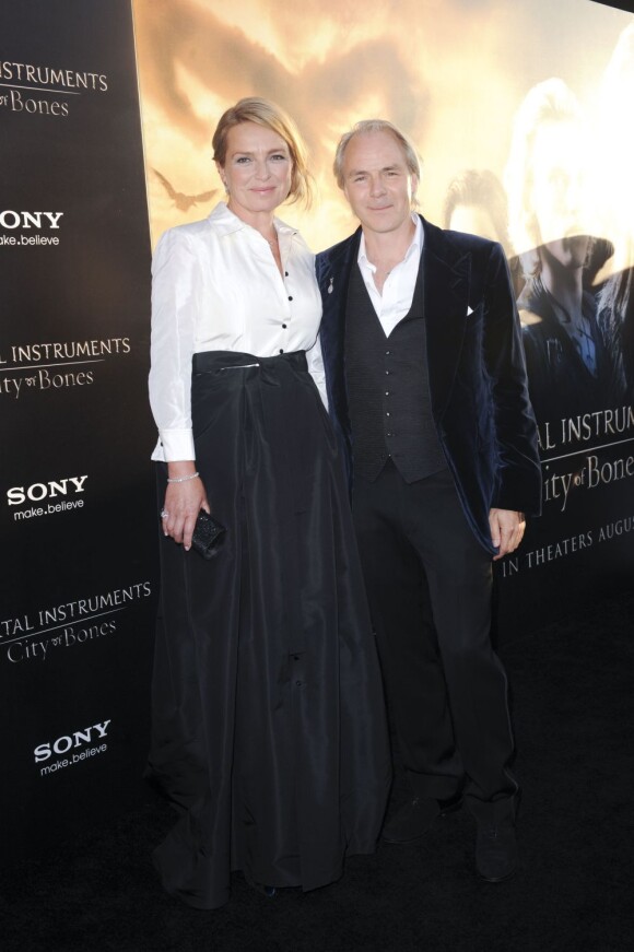 Harald Zwart et sa femme à la première de The Mortal Instruments : La Cité des Ténèbres, à Los Angeles, le 12 août 2013.