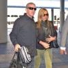 Jennifer Aniston arrive à l'aéroport de Los Angeles, le 12 août 2013.
