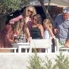 Le top britannique Kate Moss, sa fille Lila et son mari Jamie Hince sont en vacances à Formentera et profitent d'une belle journée pour sortir en mer avec des amis. Le 14 août 2013
Photo exclusive