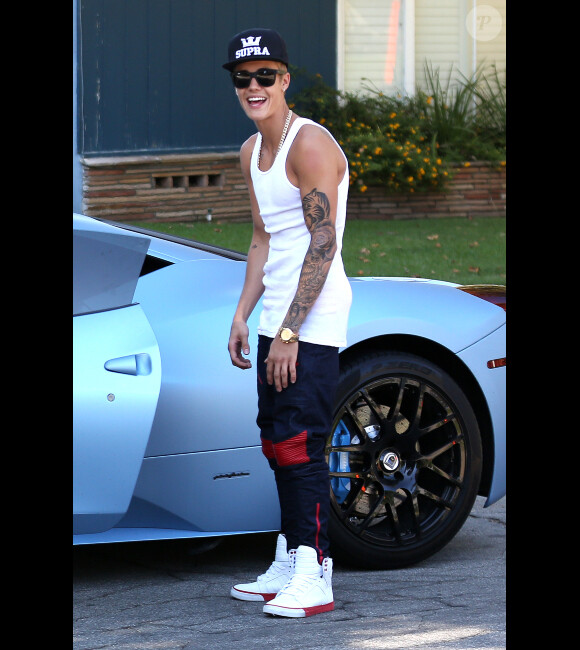 Justin Bieber, hilare, à Los Angeles le jeudi 15 août 2013.