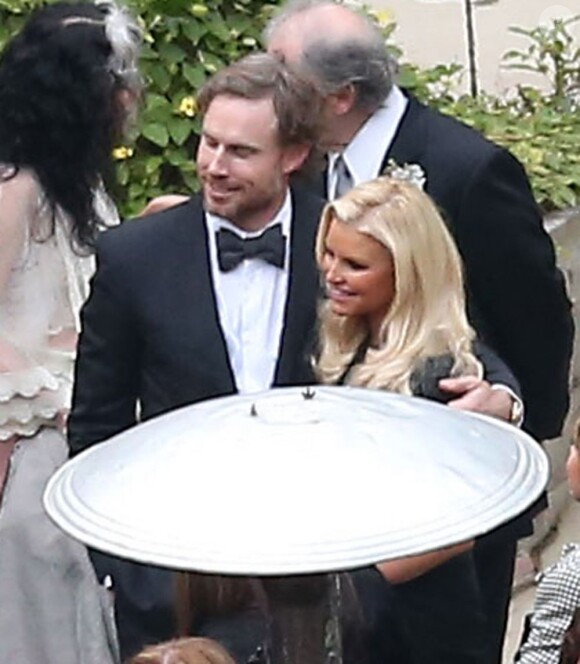 Jessica Simpson et son mari Eric au mariage de Donald Faison et CaCee Cobb le 15 décembre 2012 dans la maison de Zach Braff.