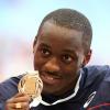 Teddy Tamgho célèbre sa médaille d'or aux Mondiaux de Moscou en triple saut, le 18 août 2013.