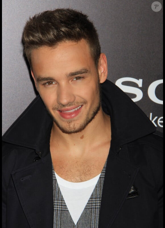 Liam Payne du groupe One Direction à New York, pour la sortie de This is us, en août 2013.