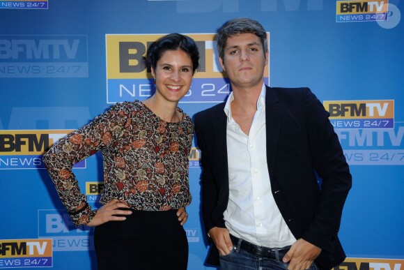 Apolline de Malherbe, Jean-Baptiste Boursier lors de la conférence de rentrée de RMC et BFMTV à Paris le 4 septembre 2013.