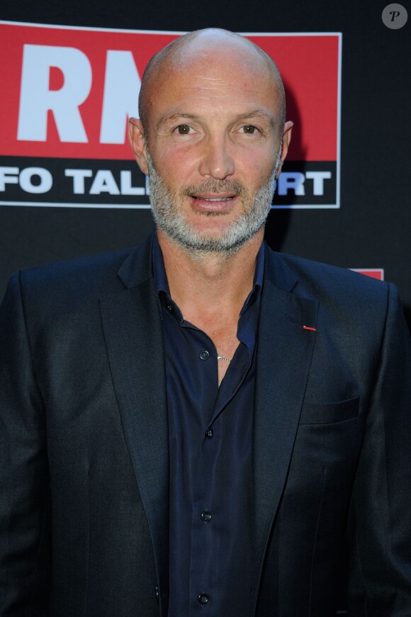 L'ex-défenseur des Bleus Frank Leboeuf lors de la conférence de rentrée de RMC et BFMTV à Paris le 4 septembre 2013.