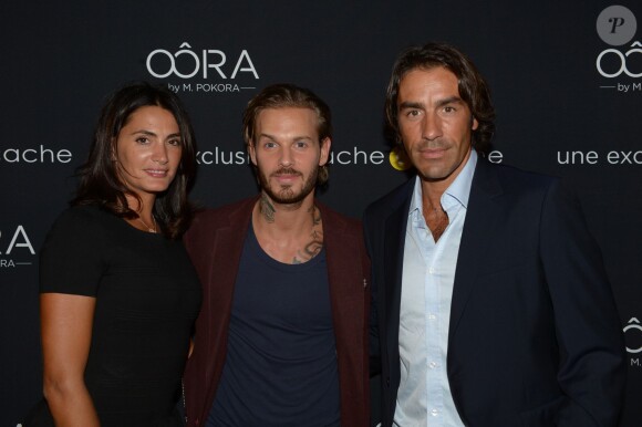 Exclusif - M. Pokora et Robert Pirès et sa femme - Soirée de lancement "OÔRA M. Pokora" au Pavillon Gabriel à Paris, le 5 septembre 2013.