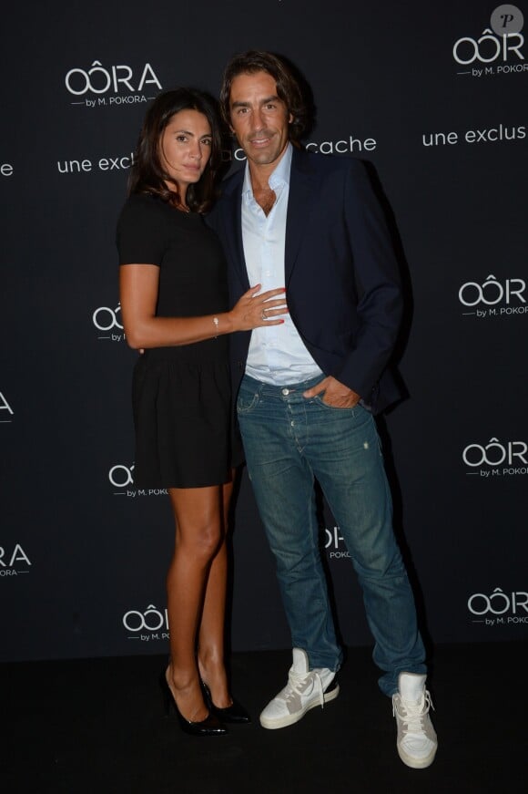 Exclusif - Robert Pirès et sa femme - Soirée de lancement "OÔRA M. Pokora" au Pavillon Gabriel à Paris, le 5 septembre 2013.