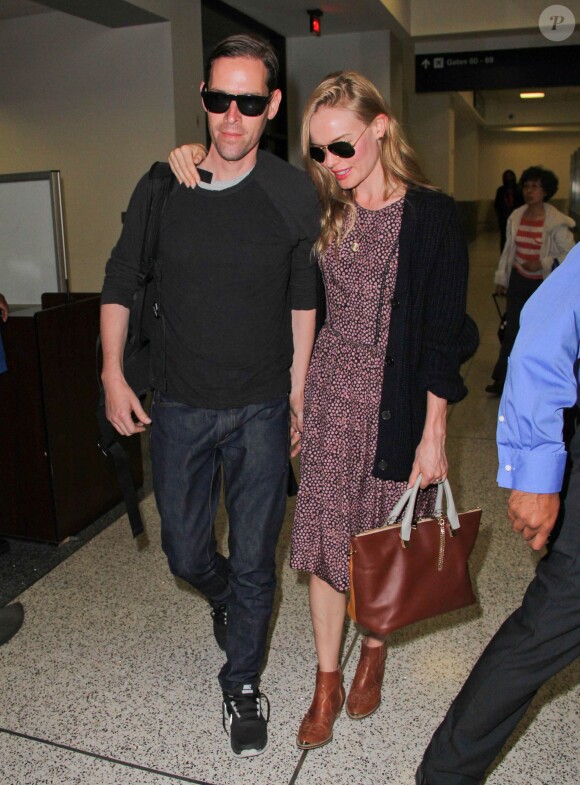 Kate Bosworth et son mari Michael Polish arrivent à Los Angeles par un vol en provenance du Montana, le 2 septembre 2013.