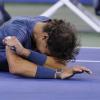 Rafael Nadal, en larmes après avoir triomphé en finale de l'US Open 2013 face à Novak Djokovic sur le court Arthur Ashe à Flushing Meadows le 9 septembre 2013