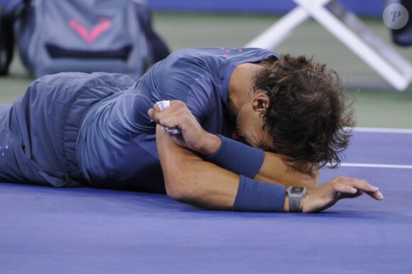 Rafael Nadal, en larmes après avoir triomphé en finale de l'US Open 2013 face à Novak Djokovic sur le court Arthur Ashe à Flushing Meadows le 9 septembre 2013