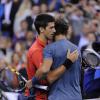 Novak Djokovic et Rafael Nadal après la finale de l'US Open 2013 à Flushing Meadows, le 9 septembre 2013