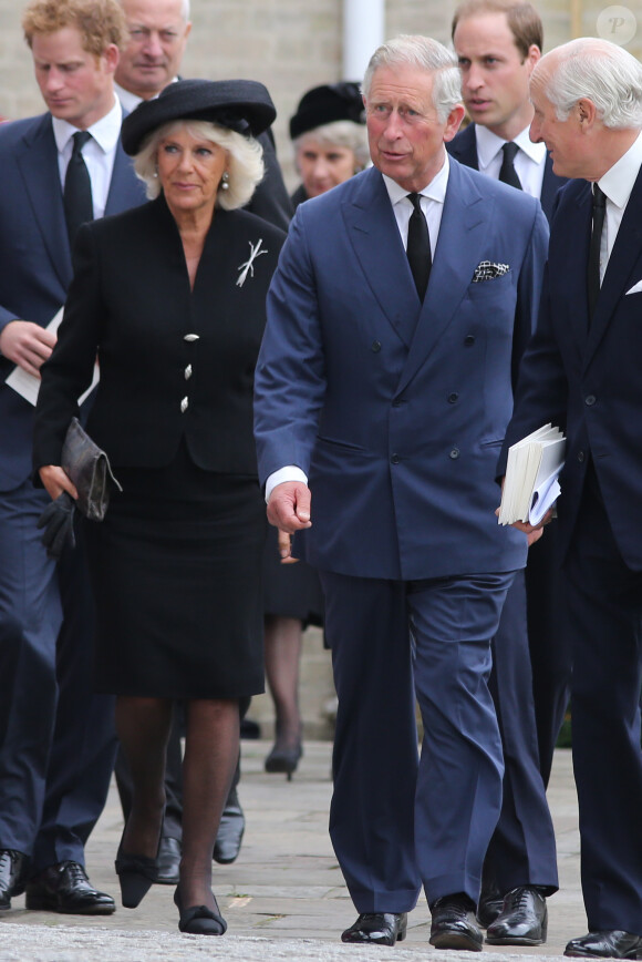 Le prince Charles, très affecté par le décès de son meilleur ami Hugh van Cutsem, était accompagné de son épouse Camilla et de ses fils les princes William et Harry lors de ses obsèques, célébrées le 11 septembre 2013 à la cathédrale de Brentwood, dans l'Essex.