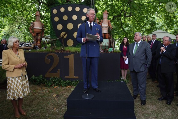 Le prince Charles et Camilla Parker Bowles à Clarence House le 11 septembre 2013 pour une réception mettant à l'honneur les produits typiques, après les obsèques de Hugh van Cutsem.