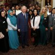  Le prince Charles lors d'une réception à Clarence House le 11 septembre 2013, quelques heures après les obsèques de son ami Hugh van Cutsem, pour le Mosaic Leadership Program avec la princesse Badiya de Jordanie. 