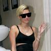 Miley Cyrus sort de son hôtel à Londres. Le 11 septembre 2013.