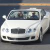 Jennifer Lopez et son petit ami Casper Smart au volant de leur Bentley décapotable arrivent sur le tournage de "Danse avec les stars" à Hollywood, le 16 septembre 2013.