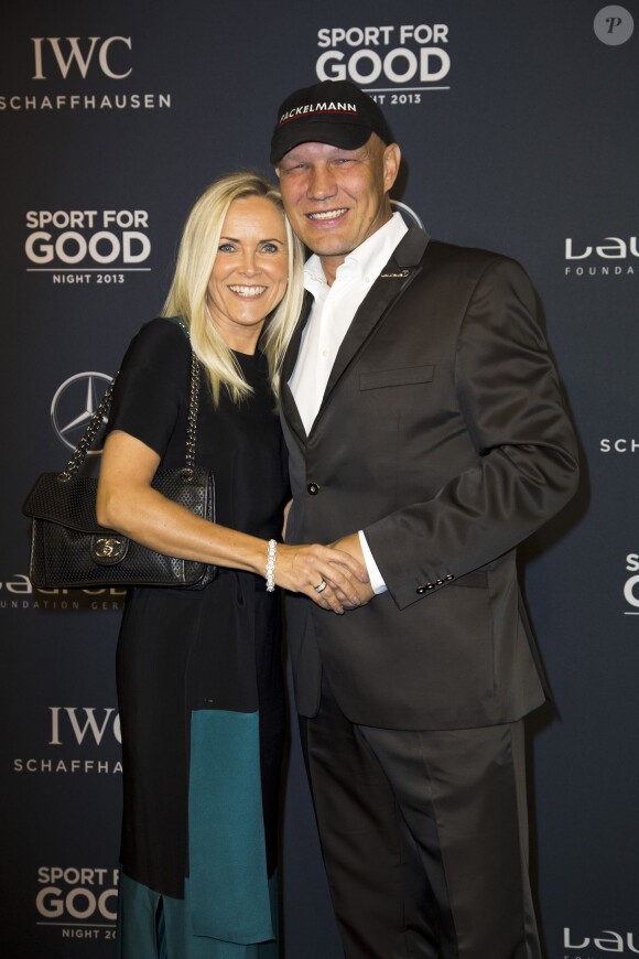 L'ancien boxeur Axel Schulz et sa femme lors du gala de charité des Laureus Sport for Good Night 2013 à l'Olympiahalle de Munich, le 20 septembre 2013