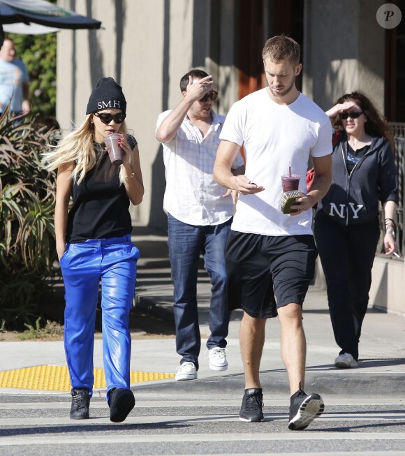 Rita Ora et son petit ami DJ Calvin Harris à l'EarthBar. Los Angeles, le 21 septembre 2013.