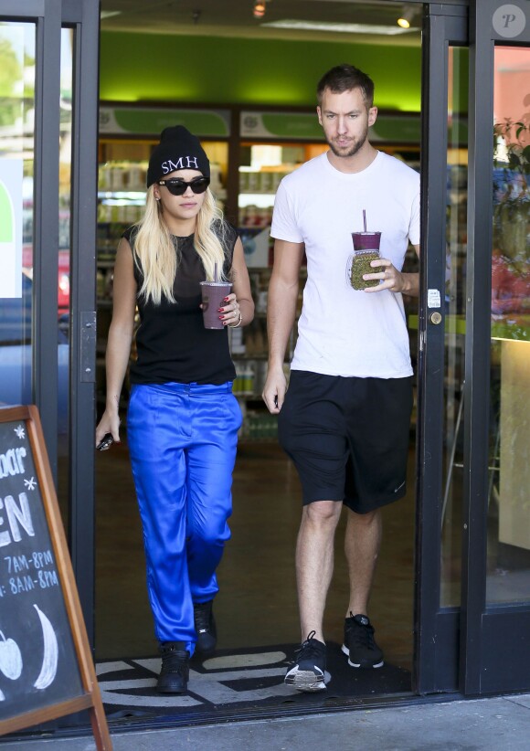 Rita Ora et son petit ami DJ Calvin Harris à l'EarthBar. Los Angeles, le 21 septembre 2013.