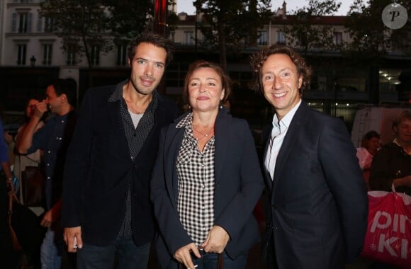 Nicolas Bedos, Catherine Frot et Stephane Bern à la générale du spectacle de Muriel Robin au théâtre de la Porte Saint-Martin à Paris, le 23 septembre 2013.