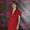 La chanteuse Camille (enceinte) assiste à la première du film " Elle s'en va" lors du Festival Paris Cinéma à Paris, le 30 juin 2013.