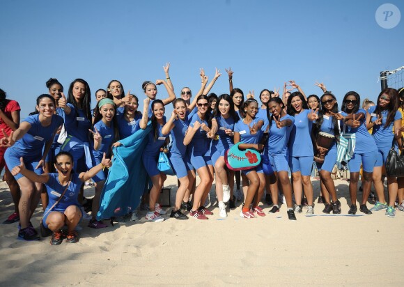 Les concurrentes au titre de Miss Monde 2013 participent a des jeux à Bali, le 10 septembre 2013