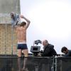 David Beckham en plein tournage d'un spot publicitaire pour David Beckham Bodywear, sa ligne de sous-vêtements pour H&M. Londres, le 1er octobre 2013.
