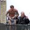 David Beckham en plein tournage d'un spot publicitaire pour David Beckham Bodywear, sa ligne de sous-vêtements pour H&M. Londres, le 1er octobre 2013.