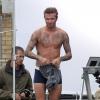 David Beckham, en boxer sur le toit d'un immeuble lors du tournage d'un spot publicitaire pour David Beckham Bodywear. Londres, le 1er octobre 2013.