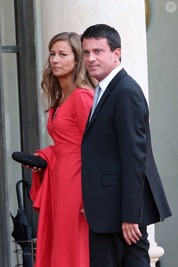 Manuel Valls et sa femme Anne Gravoin à l'Elysee a Paris le 3 septembre 2013.