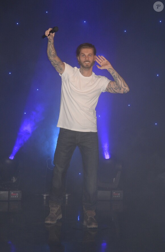 M. Pokora inaugure sa statue de cire au musée Grévin à Paris, le 7 octobre 2013.